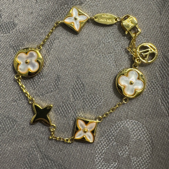 Louis Vuitton Jewelry - Louis Vuitton LV Star Gold and White Floral Bracelet